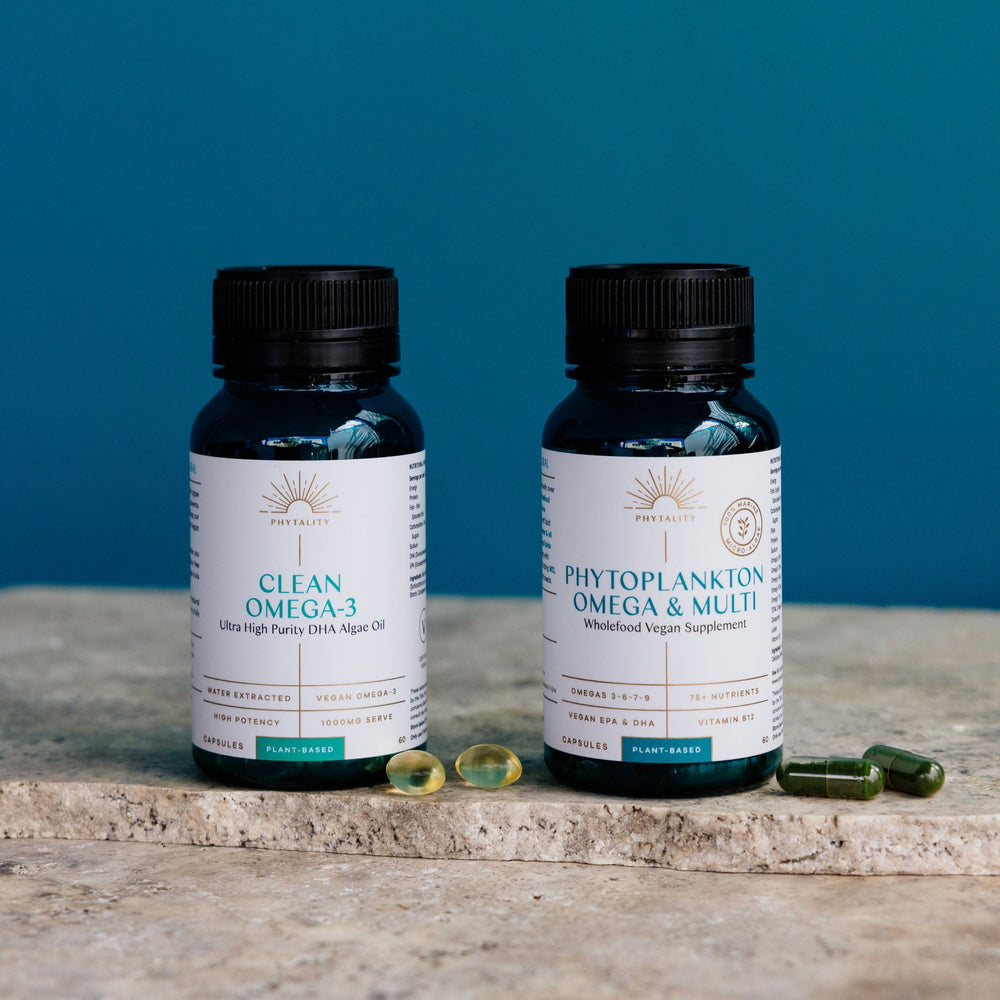 
                  
                    Two bottles of Phytality Capsuless on a stone surface with a blue background
                  
                